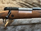 NEW WINCHESTER MODEL 70 SUPER GRADE 300 WIN MAG 26