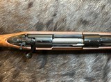 NEW WINCHESTER MODEL 70 SUPER GRADE 300 WIN MAG 26