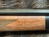 NEW WINCHESTER MODEL 70 SUPER GRADE 300 WIN MAG 26