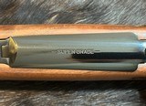 NEW WINCHESTER MODEL 70 SUPER GRADE 300 WIN MAG 26
