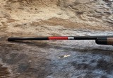 NEW WINCHESTER MODEL 70 SUPER GRADE 300 WIN MAG 26