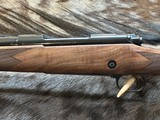 NEW WINCHESTER MODEL 70 SUPER GRADE 300 WIN MAG 26