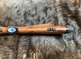 NEW WINCHESTER MODEL 70 SUPER GRADE 300 WIN MAG 26