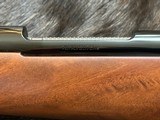 NEW WINCHESTER MODEL 70 SUPER GRADE 300 WIN MAG 26