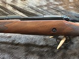 NEW WINCHESTER MODEL 70 SUPER GRADE 300 WIN MAG 26