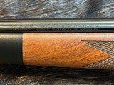 NEW WINCHESTER MODEL 70 SUPER GRADE 300 WIN MAG 26