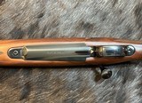 NEW WINCHESTER MODEL 70 SUPER GRADE 300 WIN MAG 26