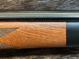 NEW WINCHESTER MODEL 70 SUPER GRADE 300 WIN MAG 26