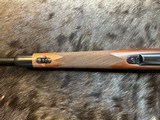 NEW WINCHESTER MODEL 70 SUPER GRADE 300 WIN MAG 26