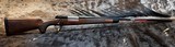 NEW WINCHESTER MODEL 70 SUPER GRADE 300 WIN MAG 26