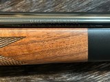 NEW WINCHESTER MODEL 70 SUPER GRADE 300 WIN MAG 26