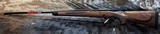 NEW WINCHESTER MODEL 70 SUPER GRADE 300 WIN MAG 26