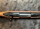NEW WINCHESTER MODEL 70 SUPER GRADE 300 WIN MAG 26