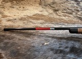 NEW WINCHESTER MODEL 70 SUPER GRADE 300 WIN MAG 26