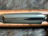 NEW WINCHESTER MODEL 70 SUPER GRADE 300 WIN MAG 26