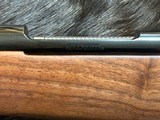NEW WINCHESTER MODEL 70 SUPER GRADE 300 WIN MAG 26