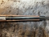 NEW WINCHESTER MODEL 70 SUPER GRADE 300 WIN MAG 26
