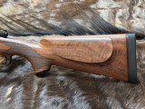 NEW WINCHESTER MODEL 70 SUPER GRADE 300 WIN MAG 26