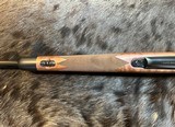 NEW WINCHESTER MODEL 70 SUPER GRADE 300 WIN MAG 26