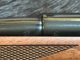 NEW WINCHESTER MODEL 70 SUPER GRADE 300 WIN MAG 26
