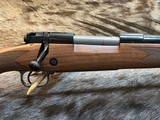 NEW WINCHESTER MODEL 70 SUPER GRADE 300 WIN MAG 26