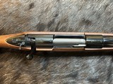 NEW WINCHESTER MODEL 70 SUPER GRADE 300 WIN MAG 26