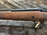 NEW WINCHESTER MODEL 70 SUPER GRADE 300 WIN MAG 26