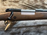 NEW WINCHESTER MODEL 70 SUPER GRADE 300 WIN MAG 26