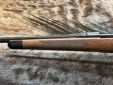 NEW WINCHESTER MODEL 70 SUPER GRADE 300 WIN MAG 26