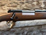 NEW WINCHESTER MODEL 70 SUPER GRADE 300 WIN MAG 26