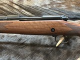 NEW WINCHESTER MODEL 70 SUPER GRADE 300 WIN MAG 26
