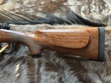 NEW WINCHESTER MODEL 70 SUPER GRADE 300 WIN MAG 26