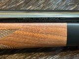 NEW WINCHESTER MODEL 70 SUPER GRADE 300 WIN MAG 26