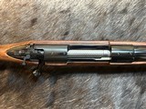 NEW WINCHESTER MODEL 70 SUPER GRADE 300 WIN MAG 26