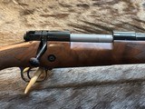 NEW WINCHESTER MODEL 70 SUPER GRADE 300 WIN MAG 26