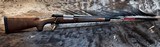 NEW WINCHESTER MODEL 70 SUPER GRADE 300 WIN MAG 26