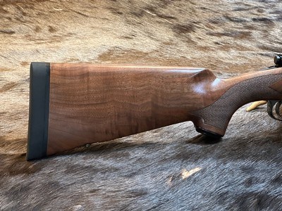 NEW WINCHESTER MODEL 70 SUPER GRADE 300 WIN MAG 26