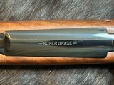 NEW WINCHESTER MODEL 70 SUPER GRADE 300 WIN MAG 26