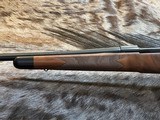 NEW WINCHESTER MODEL 70 SUPER GRADE 300 WIN MAG 26