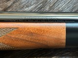 NEW WINCHESTER MODEL 70 SUPER GRADE 300 WIN MAG 26