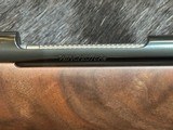 NEW WINCHESTER MODEL 70 SUPER GRADE 300 WIN MAG 26