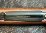 NEW WINCHESTER MODEL 70 SUPER GRADE 300 WIN MAG 26