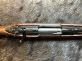 NEW WINCHESTER MODEL 70 SUPER GRADE 300 WIN MAG 26