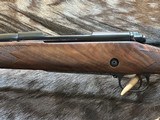 NEW WINCHESTER MODEL 70 SUPER GRADE 300 WIN MAG 26