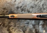 NEW WINCHESTER MODEL 70 SUPER GRADE 300 WIN MAG 26