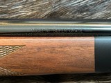 NEW WINCHESTER MODEL 70 SUPER GRADE 300 WIN MAG 26