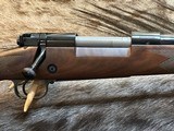 NEW WINCHESTER MODEL 70 SUPER GRADE 300 WIN MAG 26