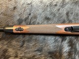 NEW WINCHESTER MODEL 70 SUPER GRADE 300 WIN MAG 26