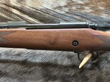 NEW WINCHESTER MODEL 70 SUPER GRADE 300 WIN MAG 26