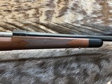 NEW WINCHESTER MODEL 70 SUPER GRADE 300 WIN MAG 26